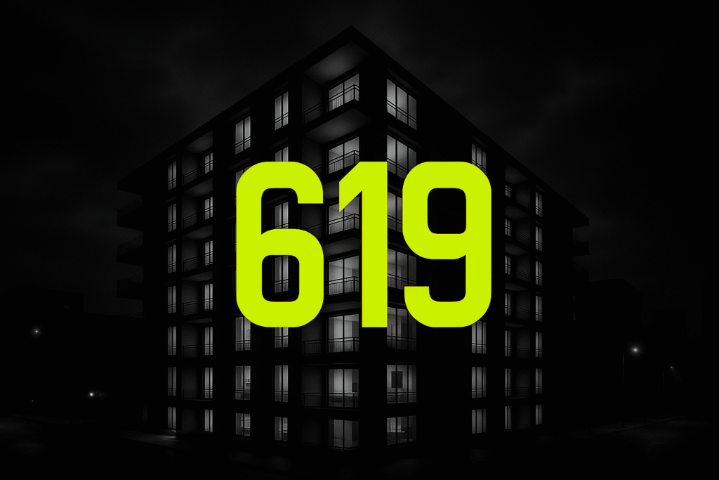 619 Recovery logo on sober living apartment building in downtown San Diego at night