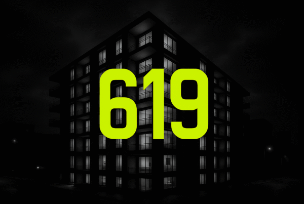 619 Recovery logo on sober living apartment building in downtown San Diego at night