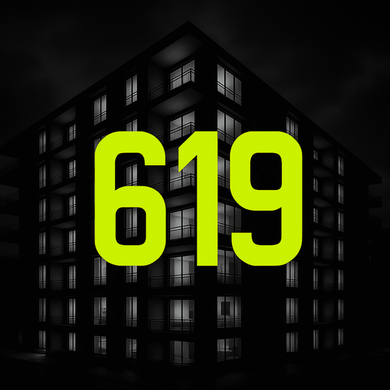 619 Recovery logo on sober living apartment building in downtown San Diego at night